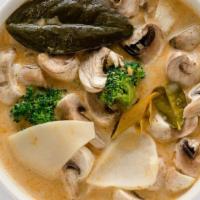 32. Tom Kha · Sour coconut soup, kaffir leaves, and mushrooms with your choice of protein.