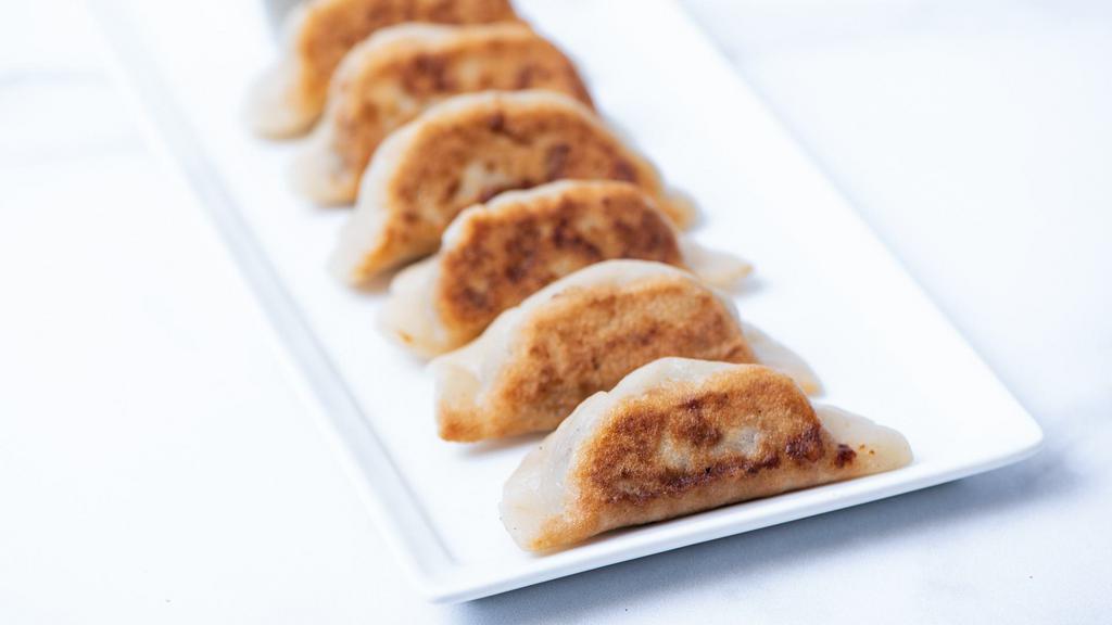 The Sweet Potato Potsticker · Gluten-free potstickers filled with sweet potato, fresh garlic, and fresh ginger. Pan fried and served with our house-made ginger garlic sauce. 5 per order. (Gluten-Free & Vegan)