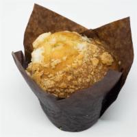Blueberry Muffin · A Fluffy and Sweet Muffin with Fresh Blueberries Mixed in the Batter.