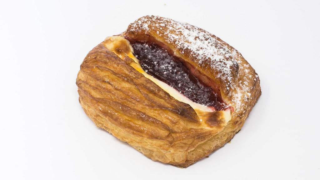 Cream Cheese Raspberry Danish Pastry · A Flaky Danish Flute Pastry Topped with Raspberry Compote and Sweet Cream Cheese