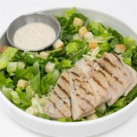 Grilled Chicken Caesar Salad  · Grilled chicken breast, crisp romaine lettuce, parmesan cheese, crouton served with Caesar d...