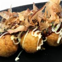 Takoyaki (9 pcs) · 9 pcs deep fried octpus filled balls, topped with takoyaki sauce and mayonnaise with bonito ...
