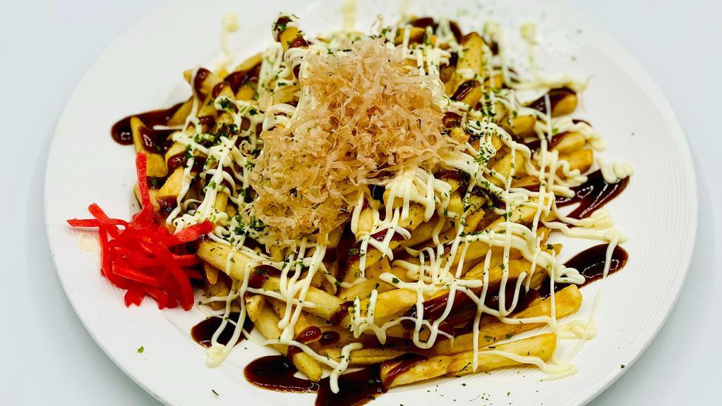 Okonomi Style French Fries · Fried potato with takoyaki sauce, mayonnaise and bonito flakes on top.