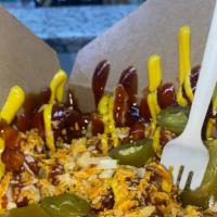Bussdown Fries · Bacon-wrapped dog, crinkle-cut fries BBQ sauce, cheese, mustard, ketchup, jalapeños, BBQ chi...