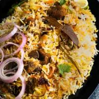 Goat Dum Biryani · Basmati rice cooked with authentic herbs and Indian spices in dum style with Goat meat