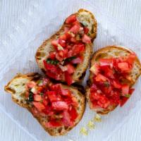 2. Bruschetta · Homemade bread - garlic, tomato, fresh basil.