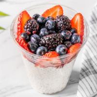 Overnight Oats with Berries · made with rolled oats, chia seeds, kefir, honey, almond milk , and mixed berries, with a sid...