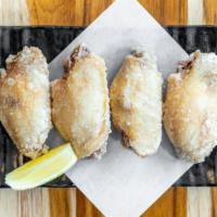 Salt and Pepper Wings · Fried chicken wings sprinkled with salt and pepper
