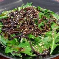 Mizuna Salad · Japanese mustard salad in house plum shiso dressing.