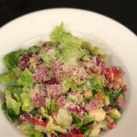 Chopped salad · Chopped salad, salami, chickpeas, roasted peppers,
olives, provolone, parmesan vinaigrette