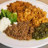 Kitfo · Chopped steak simmered in spicy authentic Ethiopian butter and seasoned with mitmita peppers...