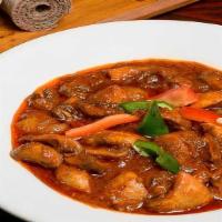 Ingudai/Mushroom Tibs · Cremini mushrooms, onions, tomatoes, ginger, garlic, berbere, and spices.
