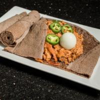 Fir-Fir · Shredded injera, onion, jalapeño, and berbere (hot spice) with/without kibe (Ethiopian butte...