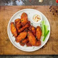 Plain Jane Wings · Fresh chicken wings breaded and fried until golden brown. Served with a side of ranch or ble...