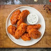Have A Habanero Wings · Fresh chicken wings breaded and fried until golden brown and tossed in mango habanero sauce....