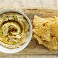 Hummus · it comes with corn chips. Vegan. Gluten free.