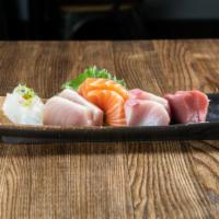 10 Slices Mixed Sashimi · Assorted slices of tuna, yellowtail, salmon and albacore.