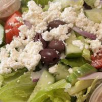 26. Athens · Romaine lettuce, tomatoes, kalamata olives, cucumbers, red onions, feta cheese, with oregano...