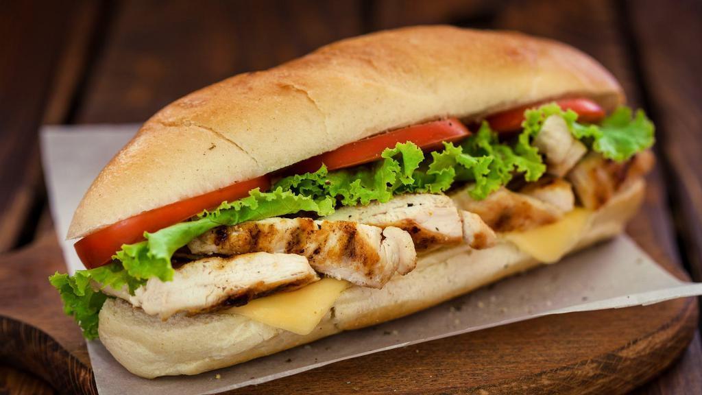 The Chicken Pesto Sandwich · Classic pesto sauce tossed on grilled chicken with mozzarella cheese, tomatoes and red onions.
