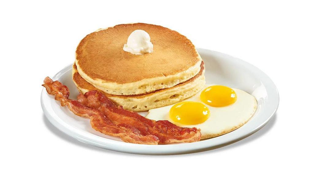 Triple Double Slam · Choose from two buttermilk pancakes, one slice of French toast or a biscuit & gravy. Served with eggs*, plus bacon strips or sausage links.