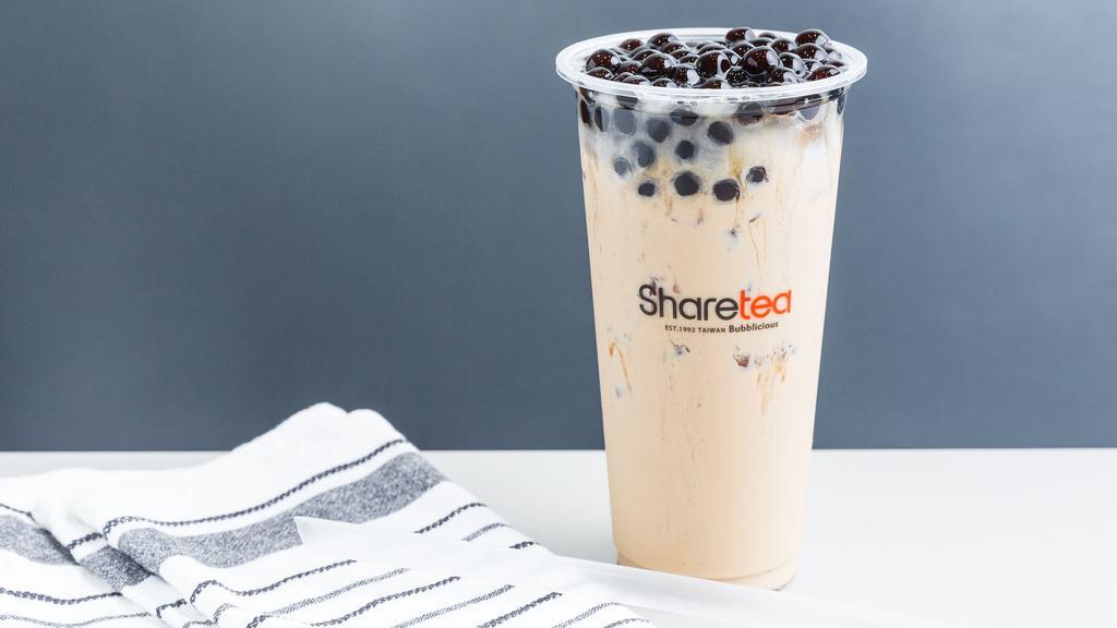 Classic Pearl Milk Tea · This drink comes with boba.