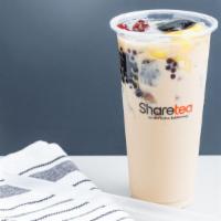 Qq Happy Family Milk Tea · Mixture of different fruity flavors, sweetness of lychee with a bit of brown sugar, mixed pe...