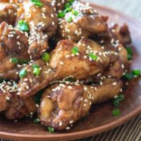 Teriyaki Wings · Hot N' Crispy Chicken wings, tossed in Teriyaki sauce and fried to perfection!