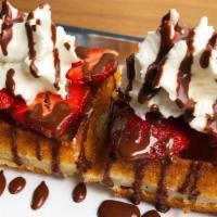 Splendor · Gluten free. Original mochi waffle, strawberries, chocolate sauce, and whipped cream.