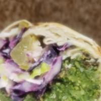 Lux Falafel Wrap (VEGAN) · Falafel, hummus, fried eggplant, potato, pickles, tomatoes, red and white cabbage, topped wi...