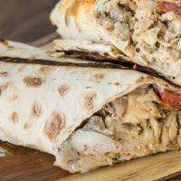 Lux Chicken Shawarma Wrap · Chicken shawarma, grilled tomatoes, seasoned onions, fried eggplant, fried potato, pickles, ...