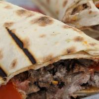 Lux Lamb Shawarma Wrap · Lamb shawarma, grilled tomatoes,  seasoned onions, fried potatoes, fried eggplants, pickles,...