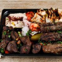 Kabob Sampler Plate  Chicken + Lamb + Kefta · A meat lover favorite for you get the taste of chicken, lamb, and ground beef kabab along wi...