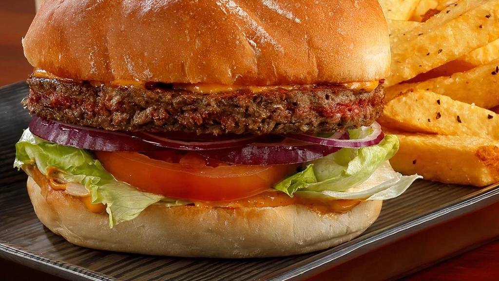 Impossible Burger (PLANT BASE MEAT) · Meatless burger on a bun with sauce, tomatoes, onion, lettuce and cheese. With a choice of fries or jerusalem salad.