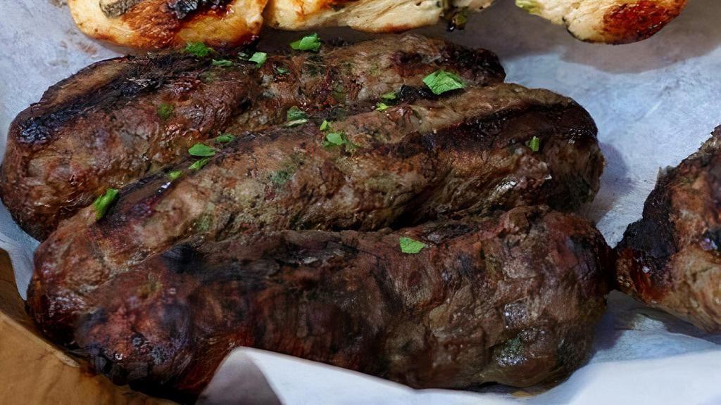 Kefta kabob  Skewer · Grilled seasoned ground beef and lamb on skewers.