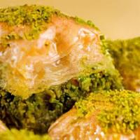 Pistachio Baklava 20 Pcs · Buttered layers of phyllo dough, pistachio filling and sweet syrup