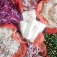 Aroma Combo Catering Tray Small · SMALL Includes: hummus, Baba Ganoush, tabouli salad, feta cheese, Red cabbage salad, 18 dolm...