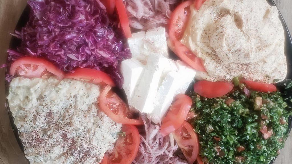 Aroma Combo Catering Tray Small · SMALL Includes: hummus, Baba Ganoush, tabouli salad, feta cheese, Red cabbage salad, 18 dolma, 18 falafel,  18 pita bread.
FOR GLUTEN FREE TABOULI: SUB TABOULI WITH QUINOA TABOULI 
Vegan Baba Ganoush is available upon request
