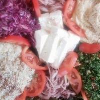 Aroma Combo Catering Tray Large · LARGE Includes: hummus, baba ganoush, tabouli salad, feta cheese, Red cabbage salad, 24 dolm...