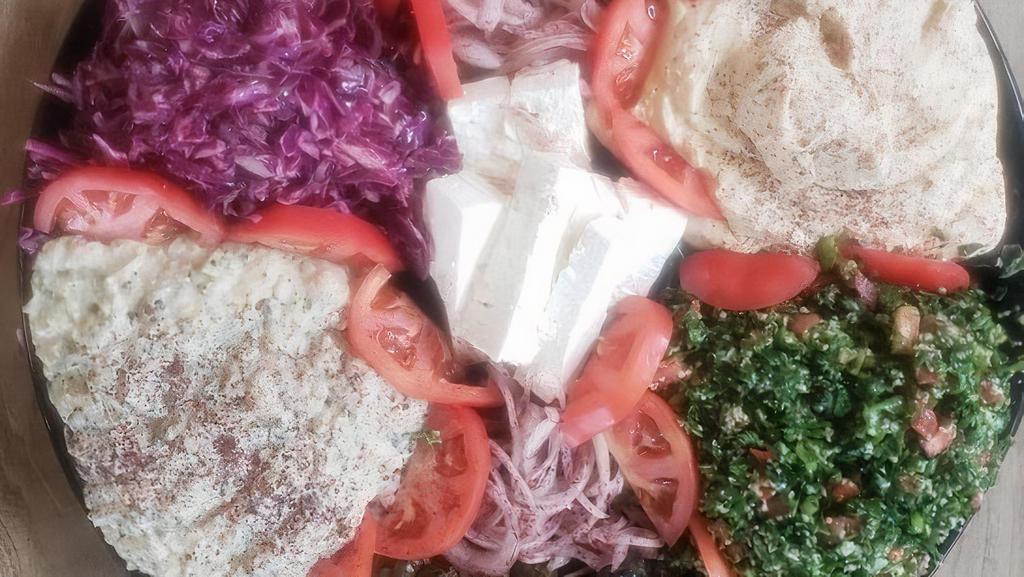 Aroma Combo Catering Tray Large · LARGE Includes: hummus, baba ganoush, tabouli salad, feta cheese, Red cabbage salad, 24 dolma, 24 falafel, 24 pita bread.
FOR GLUTEN FREE TABOULI: SUB TABOULI WITH QUINOA TABOULI 
Vegan Baba Ganoush is available upon request