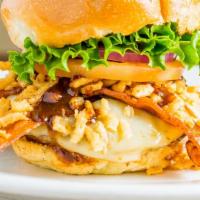 Spicy Cowboy Burger · Pepper jack, bacon, crispy onion, spicy mayo and spicy BBQ sauce. Served with side tomato, r...