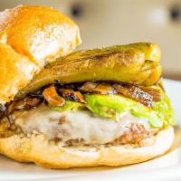 Poblana Burger · Jack, avocado, roasted bell pepper, caramelized onion and jalapeno mayo. Served with side to...