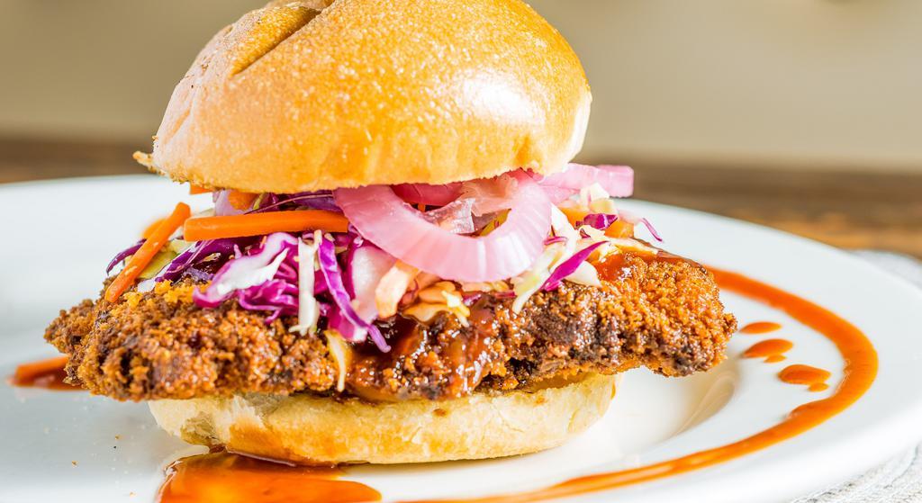 KFC (Korea Fried Chicken) Burger · Breaded chicken breast, Korean-style gochugang sauce, cabbage slaw and pickled red onion. Very spicy.