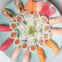 Super Sushi Combo (for 2) · 8 pieces of assorted sushi, 6 pieces spicy tuna roll, 5 pieces sashimi, 6 pieces California ...