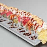 Snow Dragon Roll · Shrimp tempura inside with crab meat, tuna, and salmon on top.
