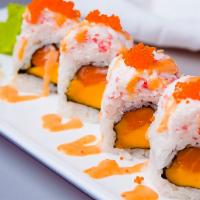 Treasure Island Roll · Mango and salmon inside with crab meat on top.