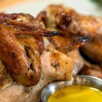 Quarter White · Limon's famous open-flame marinated rotisserie chicken, quarter white cut of meat.