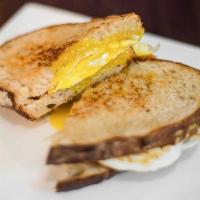 Classic Egg & Cheese · Tillamook cheddar and monterey jack. Comes with a scrambled cage-free egg and served on whol...