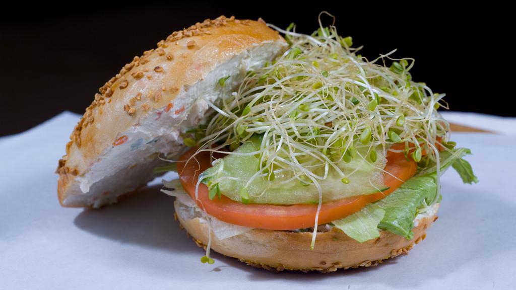 #37. Veggie Sandwich · Veggie cream cheese, Avocado, lettuce, tomato, cucumber, and sprouts.