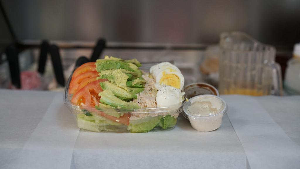 #42. Saratoga Salad · Chicken breast, chicken or tuna salad, fresh mix green veggie, hard boiled egg, avocado and salad dressing.