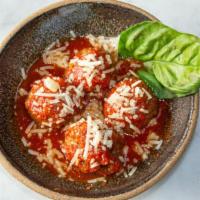 Braised Beef Meatballs   · tomato, basil, grana padano